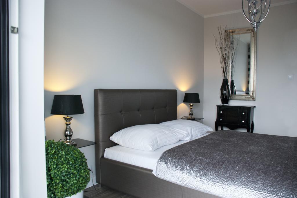Apartamenty I.M.A Towarowa Poznań Rum bild